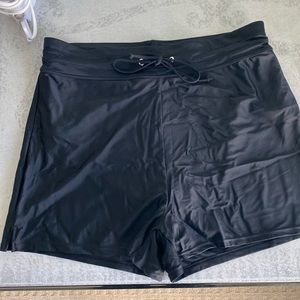 NWT Tournesol swim shorts. Tie waist and full  interior panty. Size 2XL